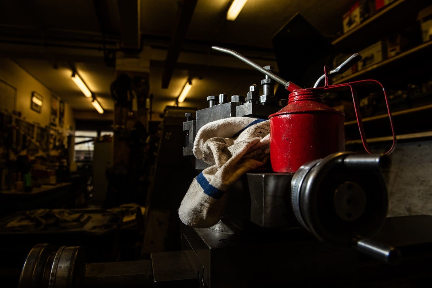 a Lindstrom industrial wiper on mechanics work bench next to oil can