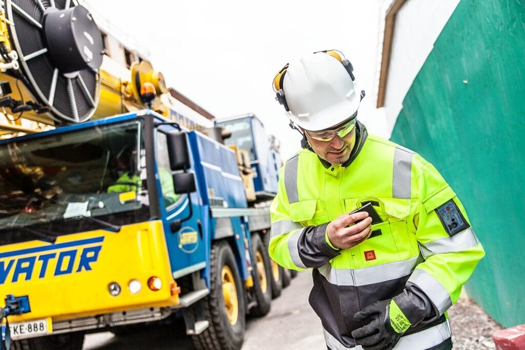 PPE workwear with helmet and other safety garments